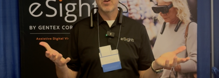 Roland Mattern, Director of Sales, at eSight showing eSight glasses